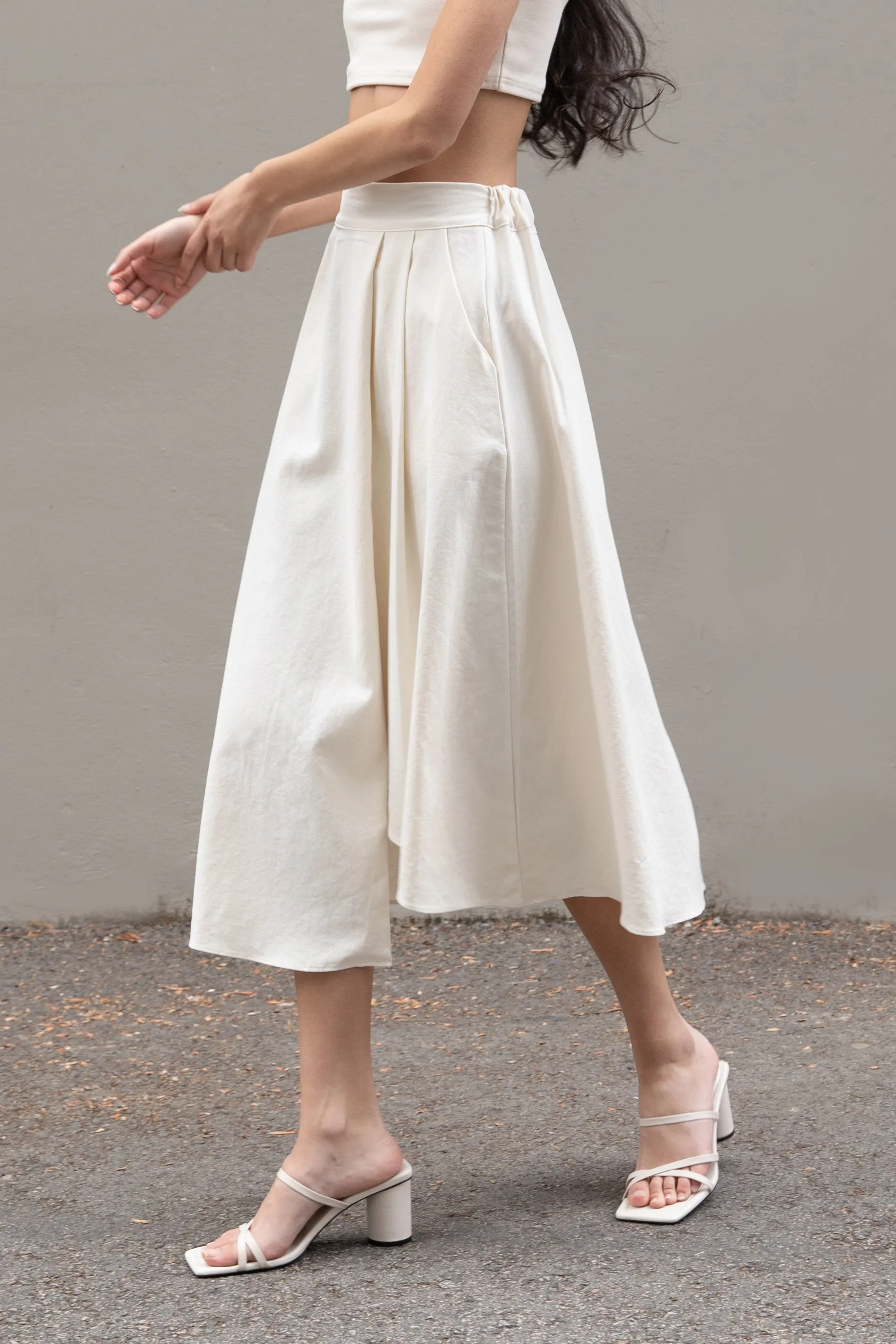 ASYMMETRICAL HEM MIDI SKIRT