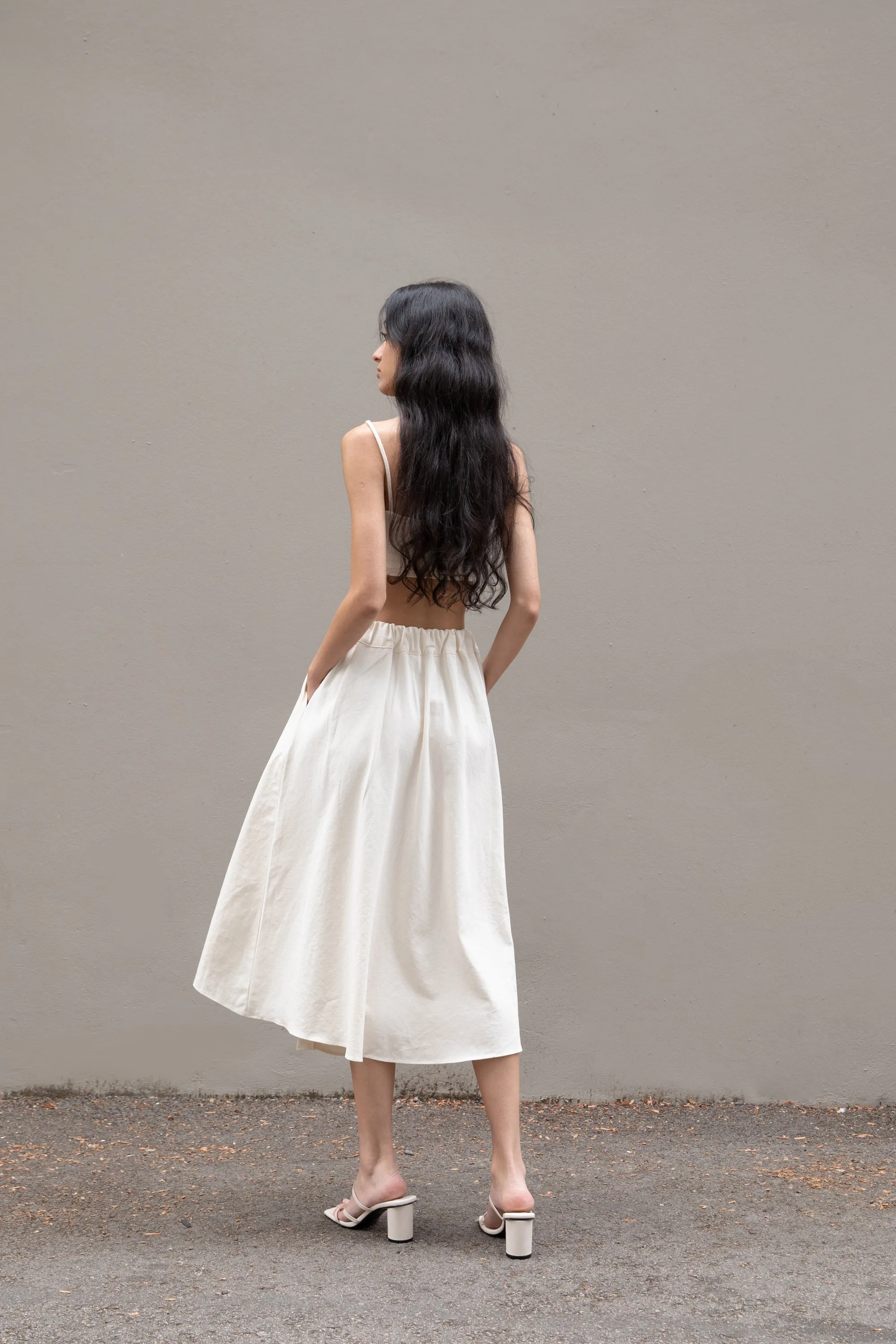 ASYMMETRICAL HEM MIDI SKIRT